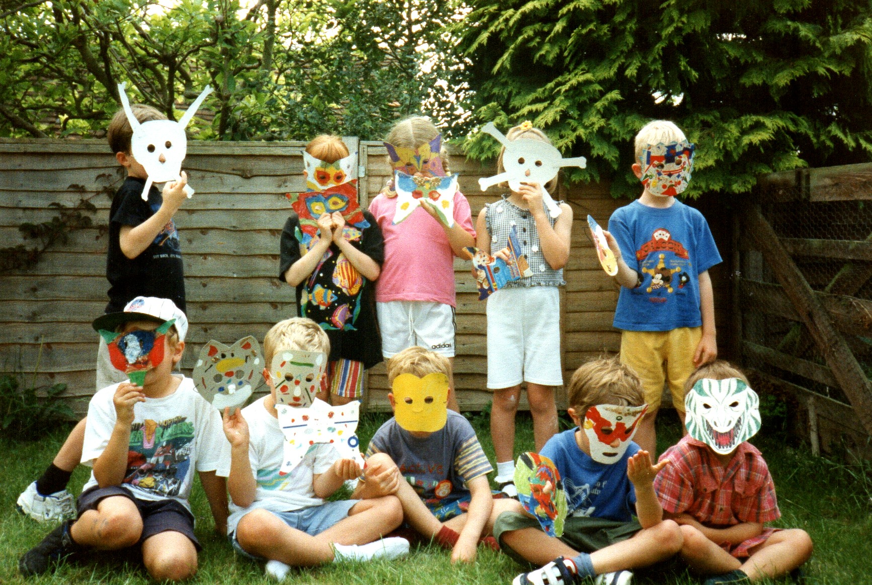 children at a birthday party with masks