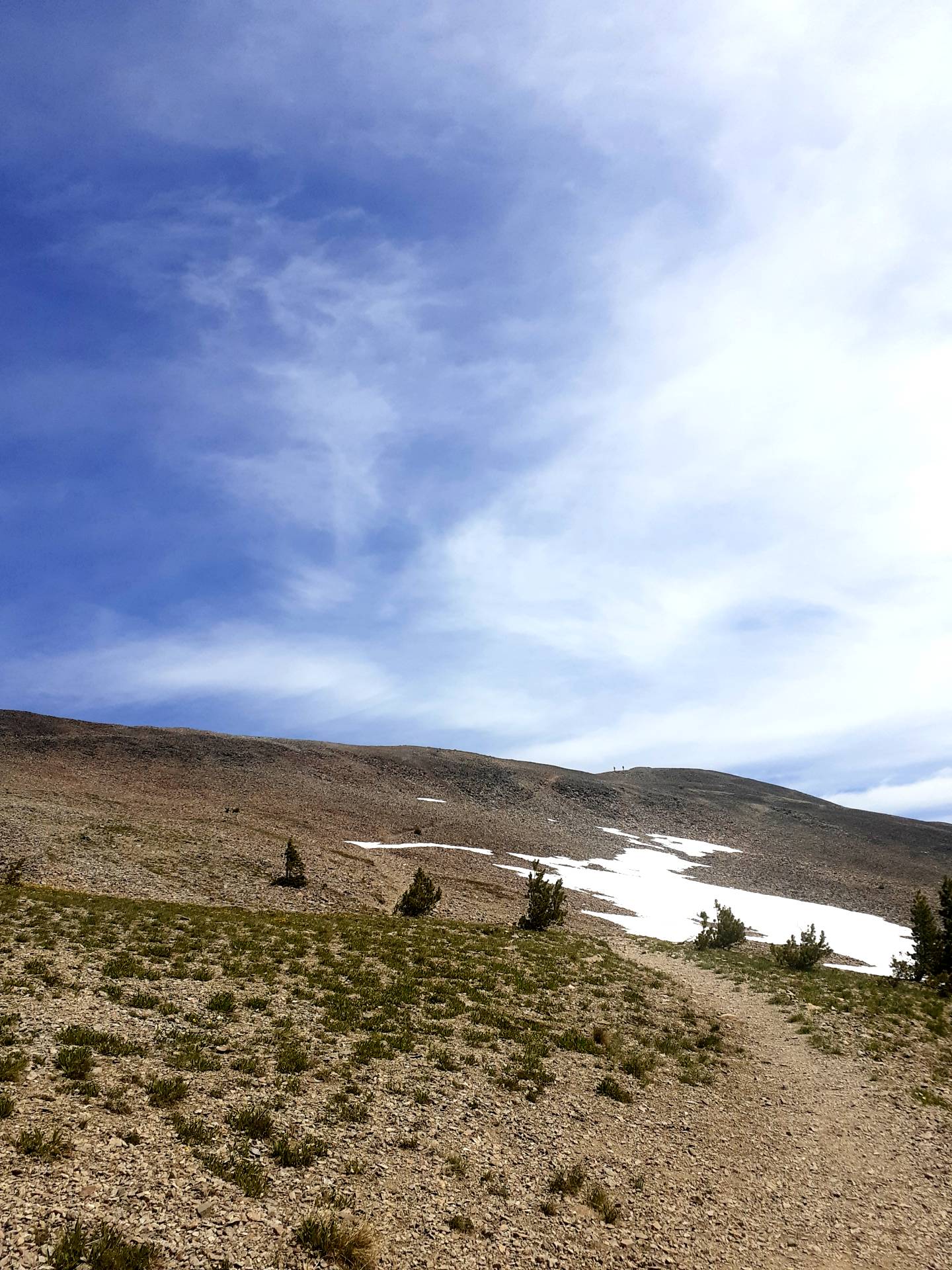 two men descending Avalanche Peak